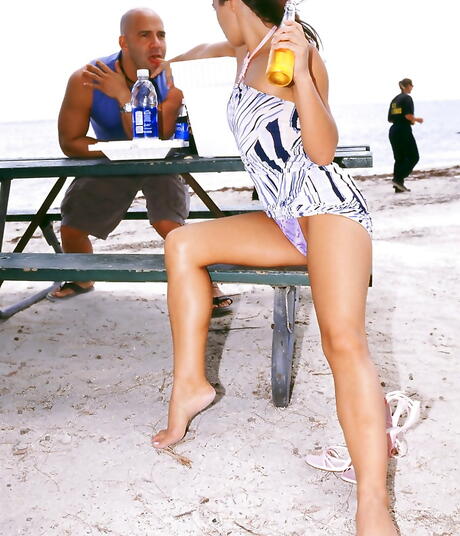 Sultry Heather show some foot fetish on the beach