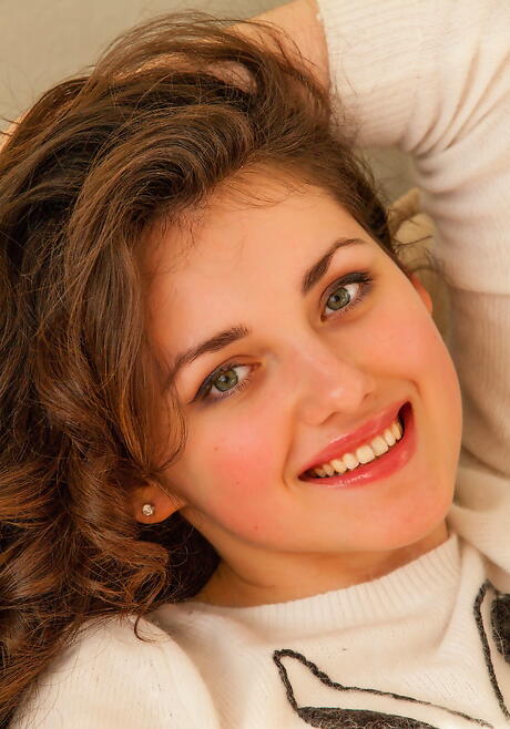 Foxy hottie Conchita reveals tiny tits and hairy pussy 